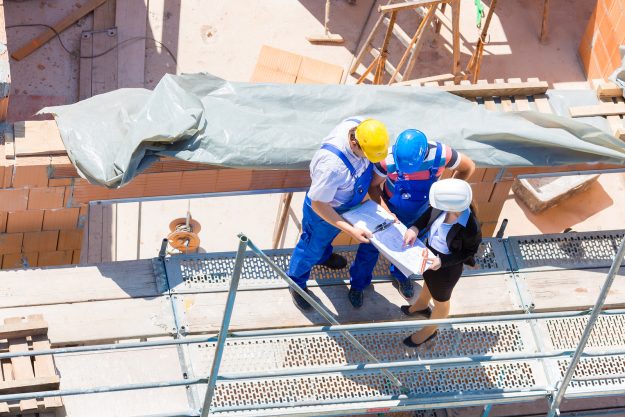 Construction site Team or architect and builder or worker with h